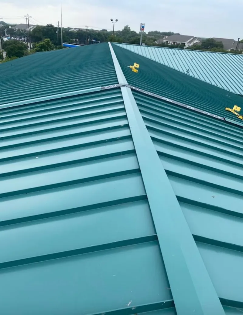 Green commercial metal roof ridge and valley for Metal Roof Repair in Hidden Valley