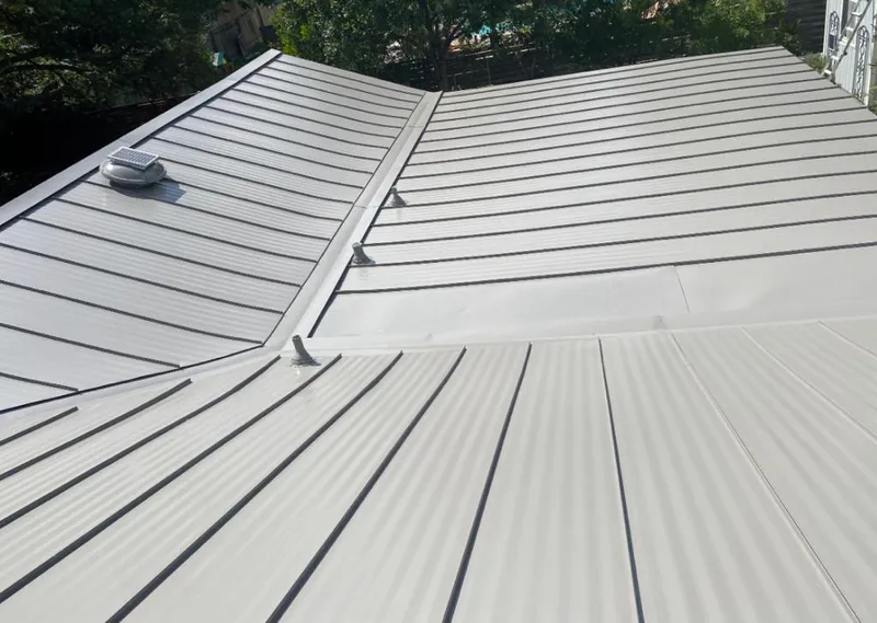 Solar attic fan installed on a metal roof for Roof Ventilation in Hidden Valley